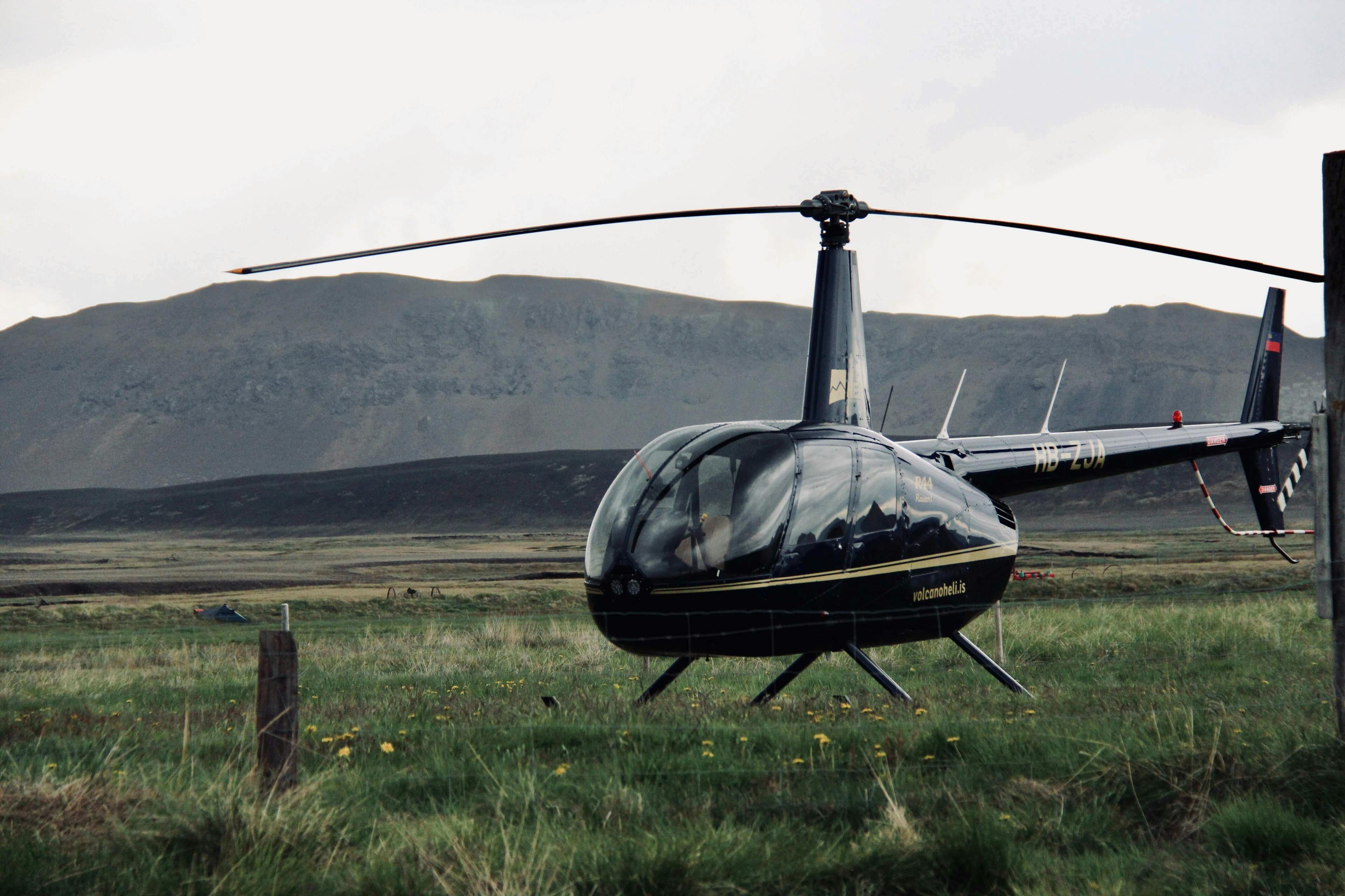 R44 Helicopter in open field